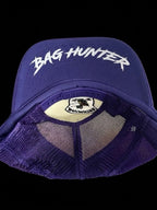 PURPLE BAG HUNTER HAT